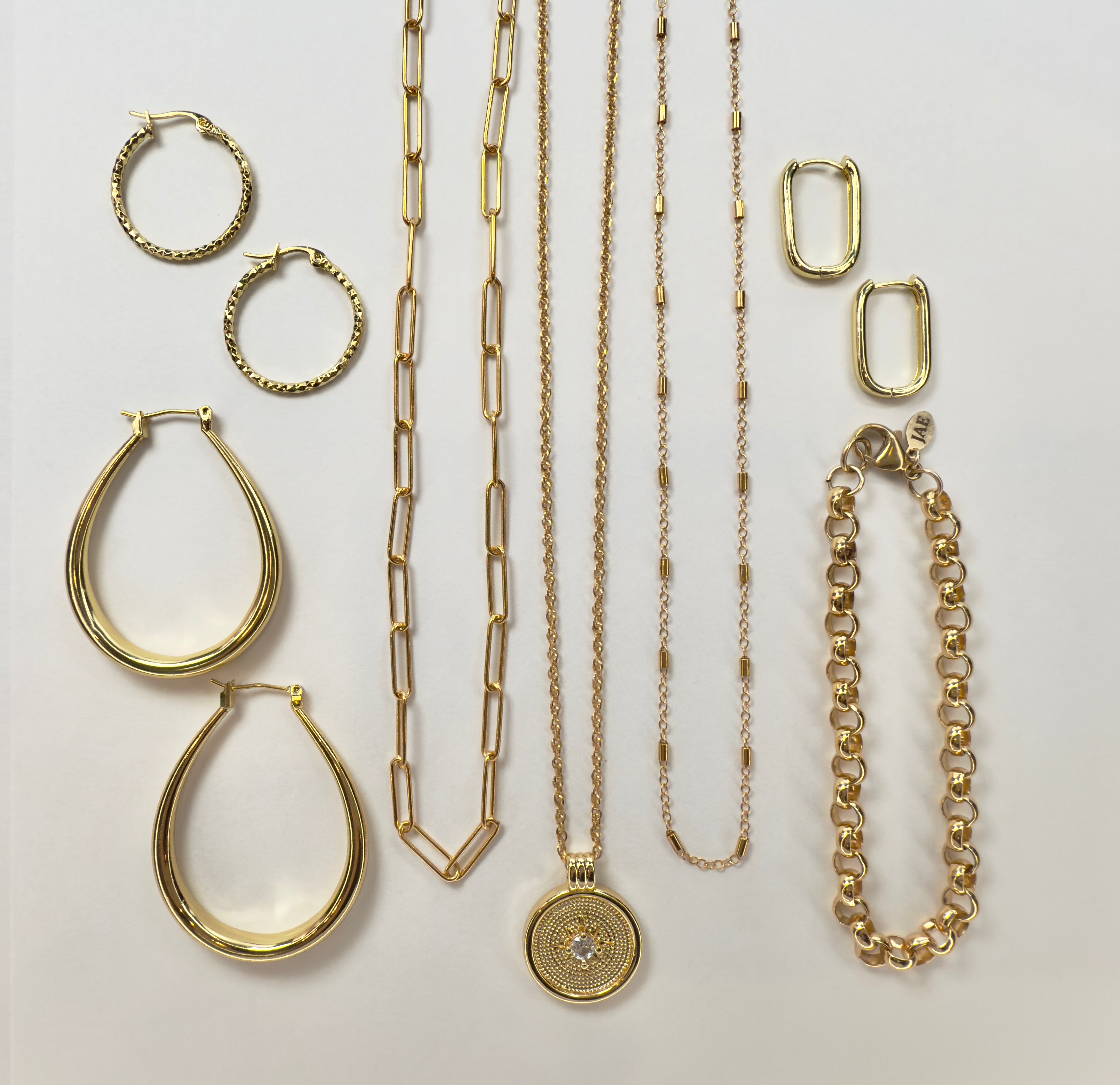 "The Buzz" Drop Shape Hoop Earring