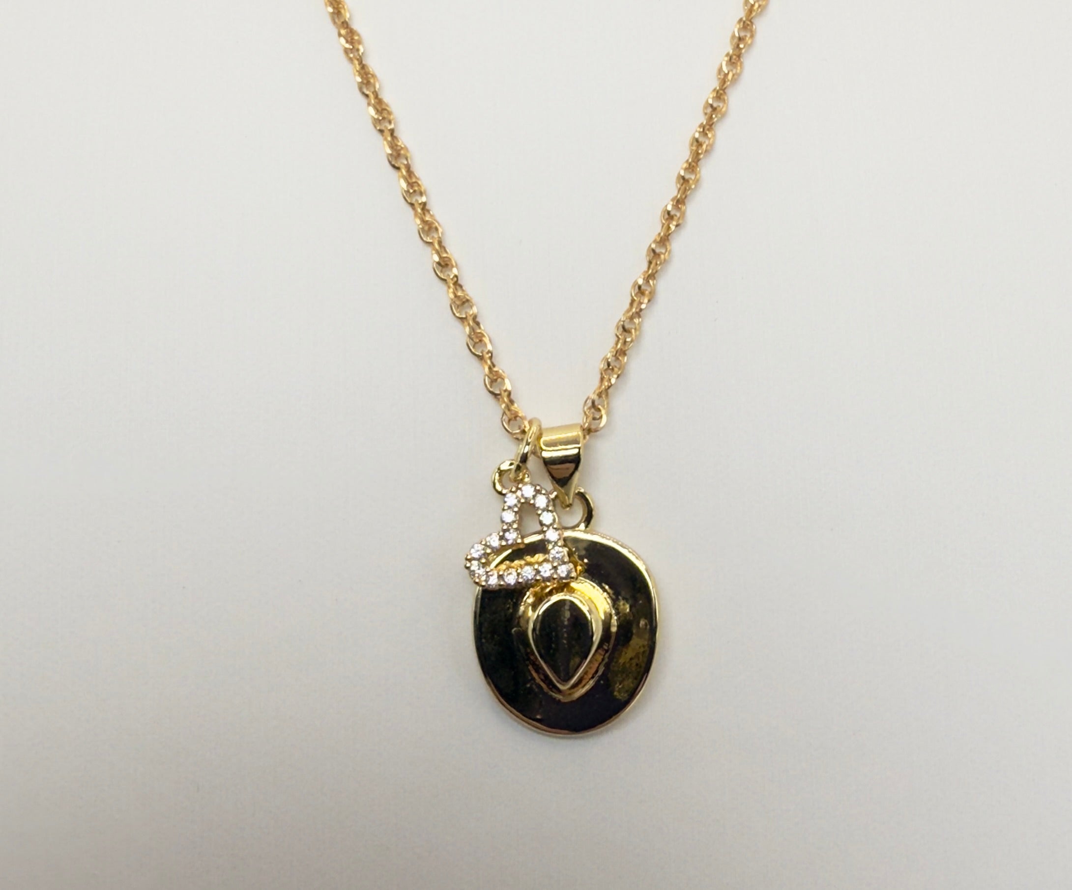 The Cain Cowboy Hat and Heart Necklace
