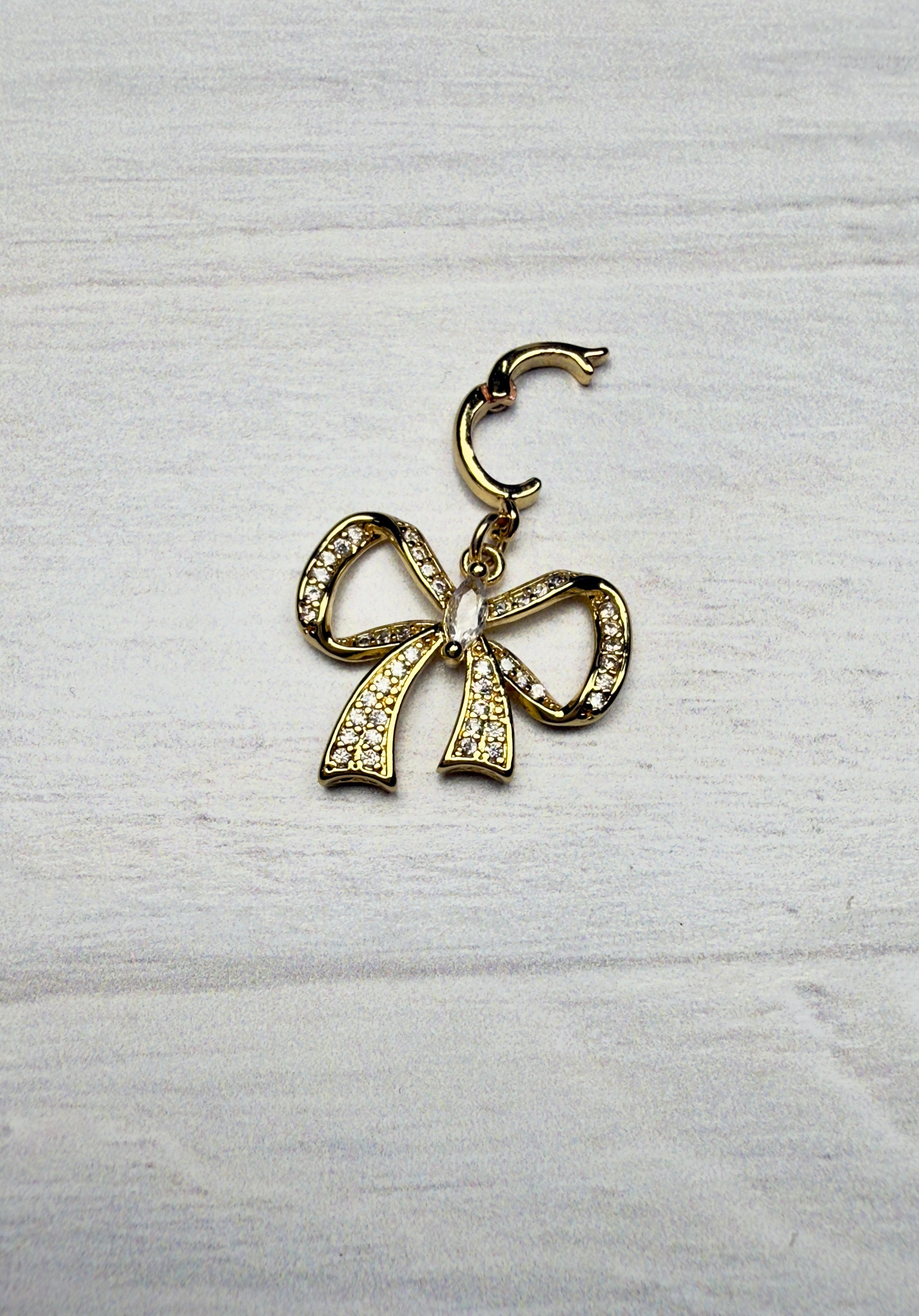 The Cary - Fancy Cubic Zirconia Gold Bow Clip-on Charm
