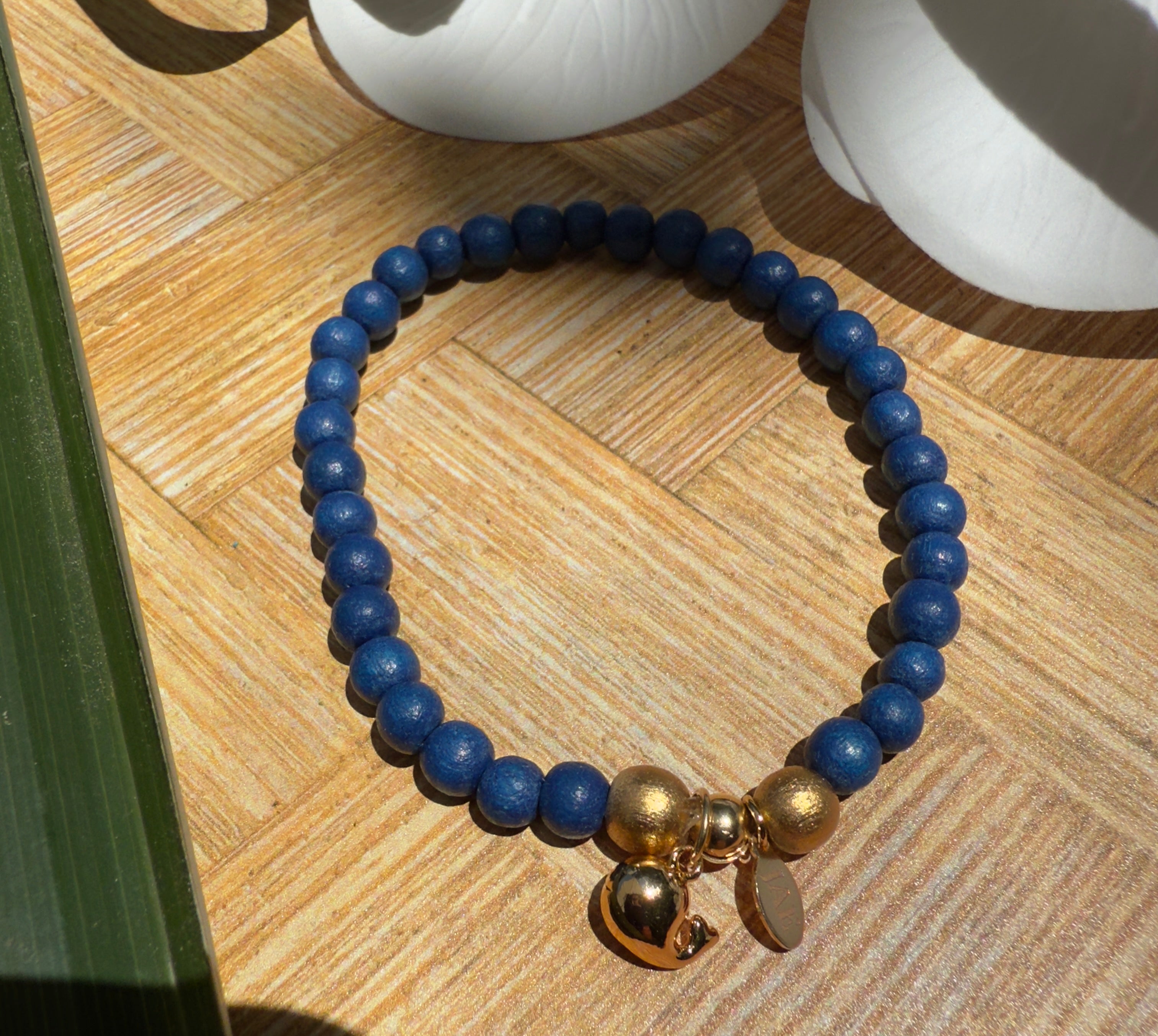 Navy Blue Wooden Bead Slip-on Style Bracelet with Pufferfish Charm