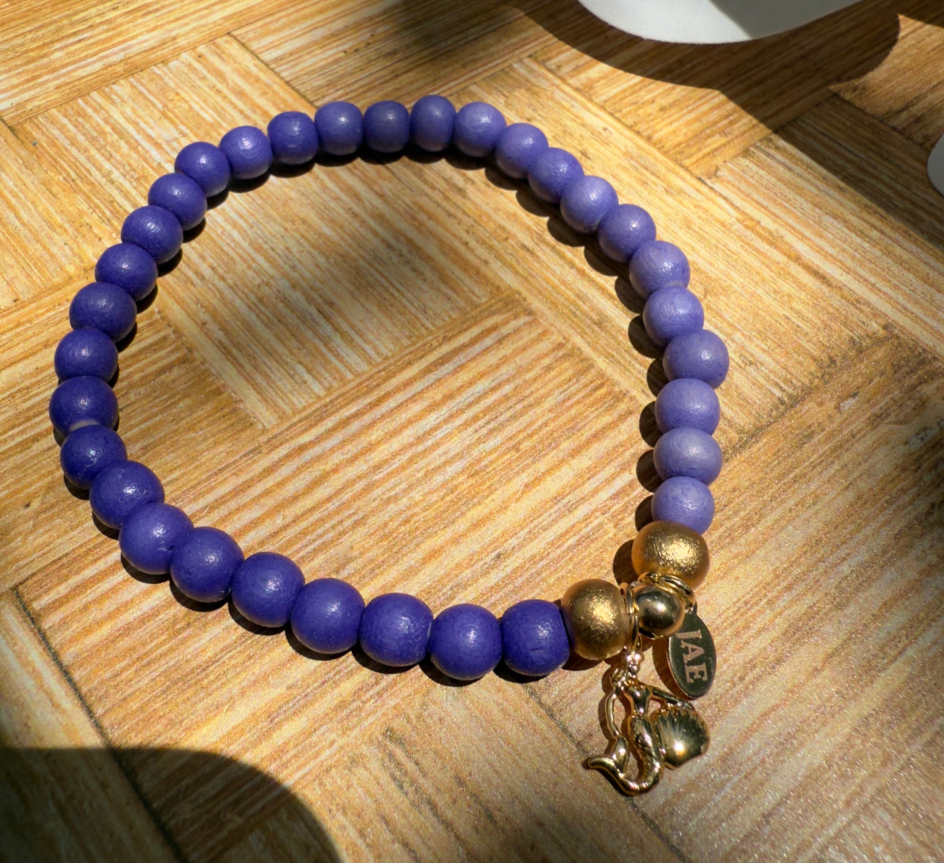 Purple Ombre Colored Wooden Bead Slip-on Style Bracelet with Mermaid Charm