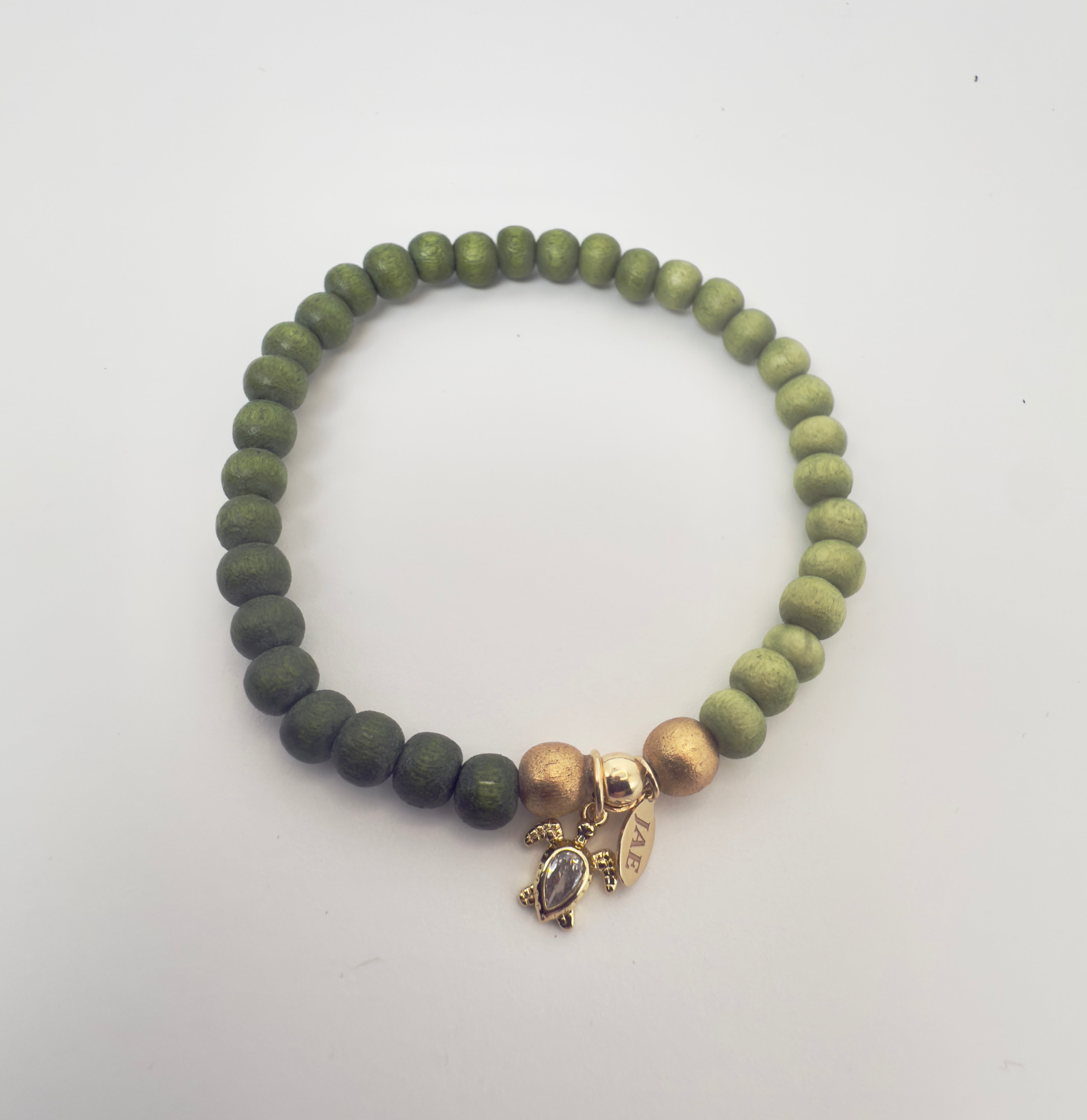 Green Ombre Wood Bead Slip-on Style Bracelet with Sea Turtle Charm