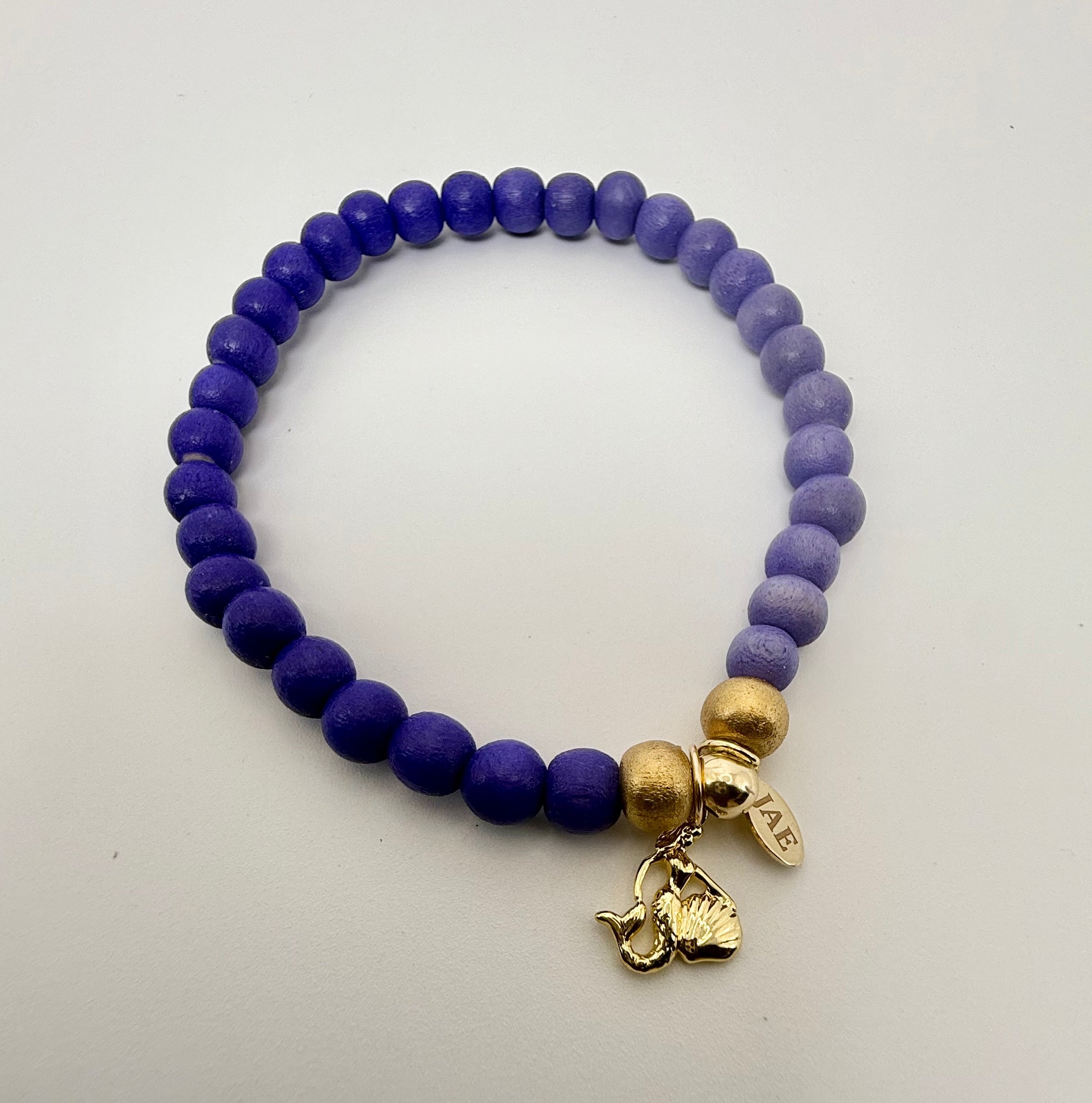 Purple Ombre Colored Wooden Bead Slip-on Style Bracelet with Mermaid Charm
