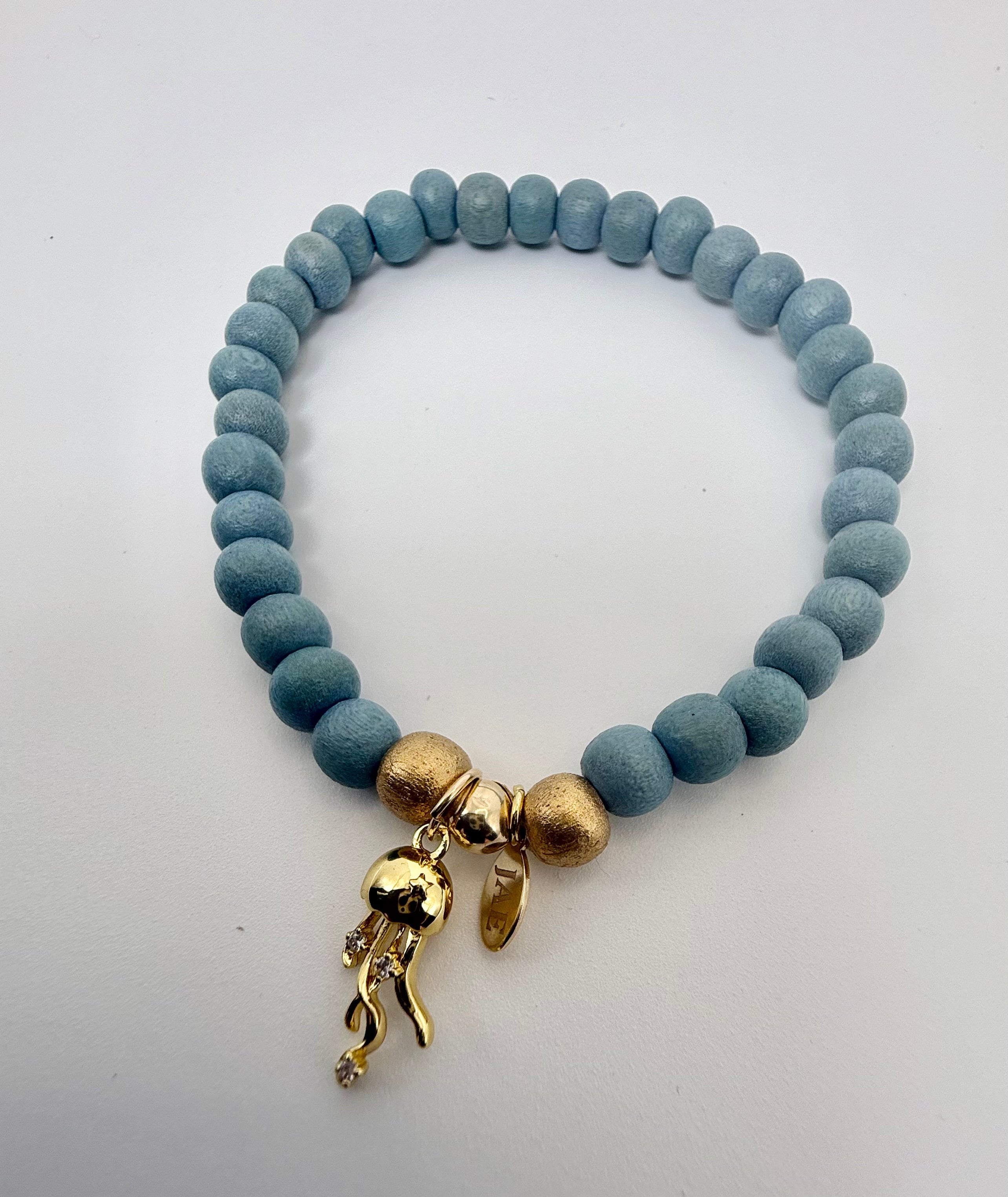 Blue Wooden Bead Slip-on Style Bracelet with Jellyfish Charm