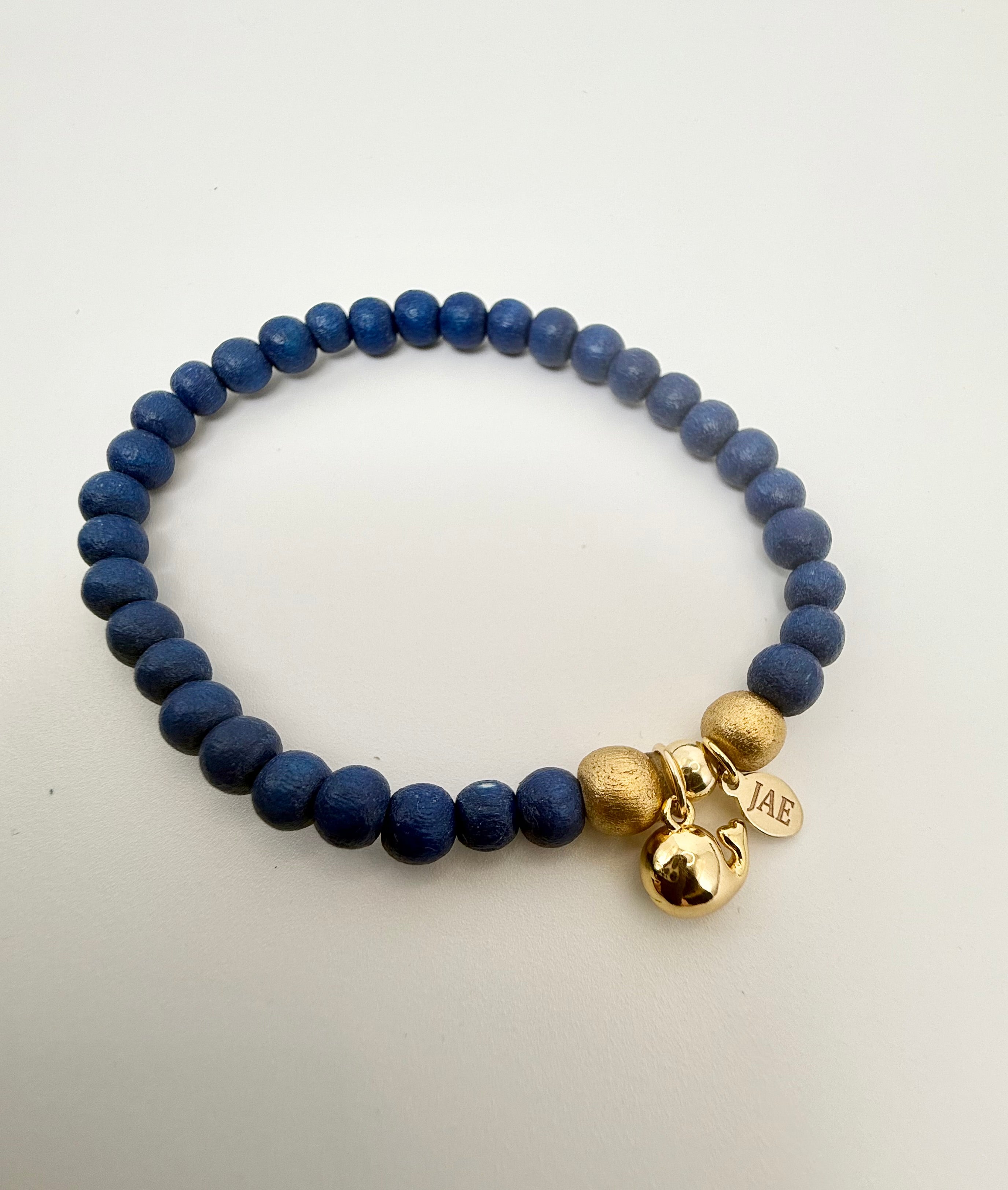 Navy Blue Wooden Bead Slip-on Style Bracelet with Pufferfish Charm