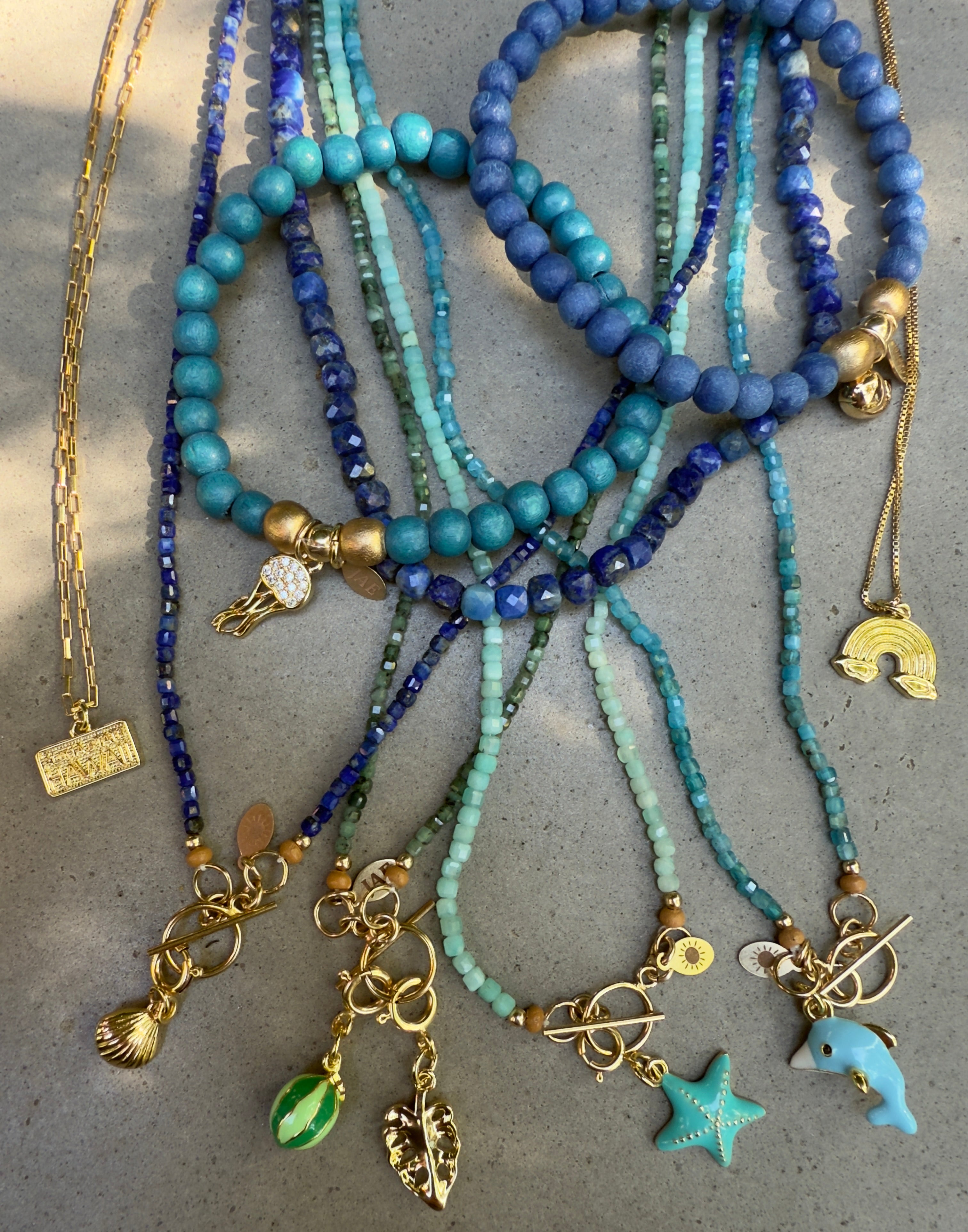 Teal Colored Wooden Bead Slip-on Style Bracelet with Jellyfish with CZ Charm