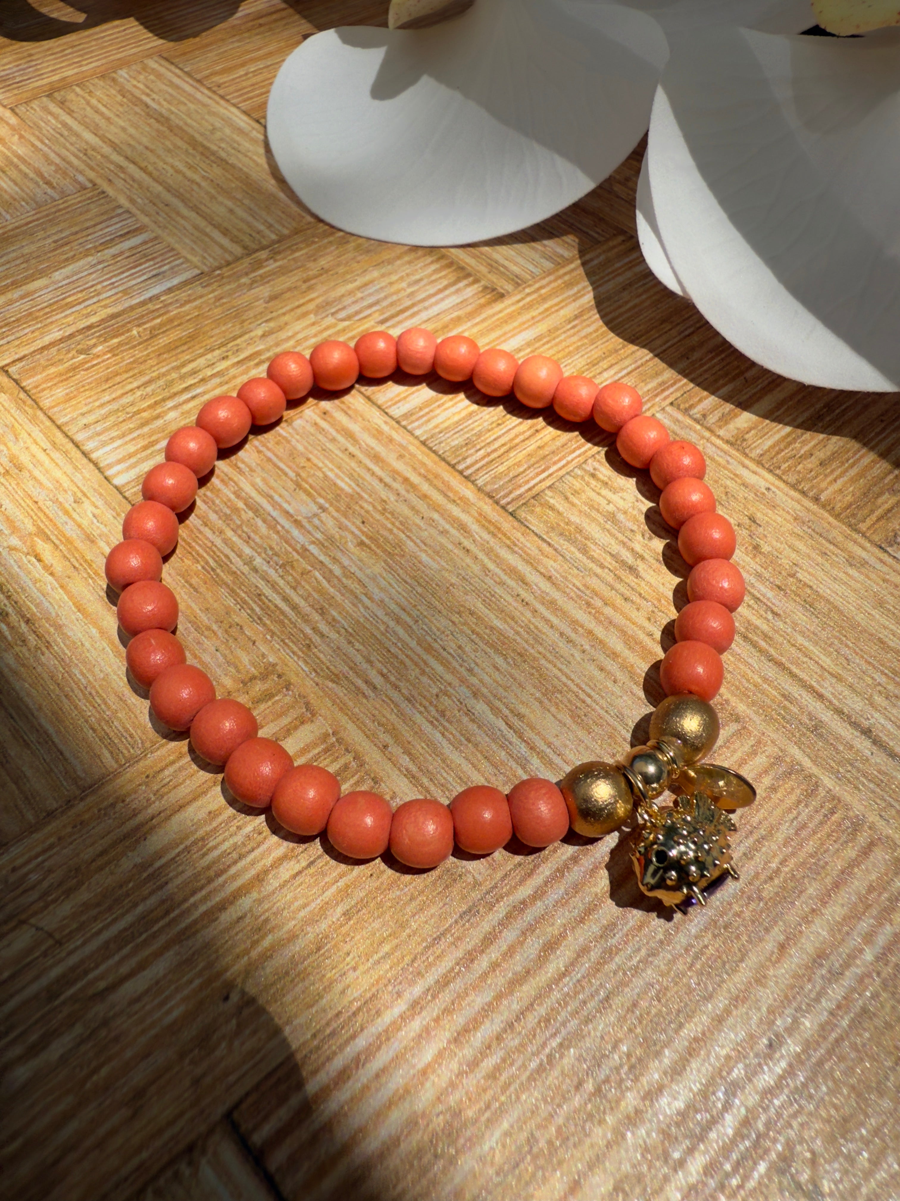 Orange Wooden Bead Slip-on Style Bracelet with Pufferfish Charm